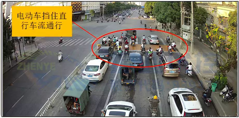 圖5 電動(dòng)車擋住直行車流通行